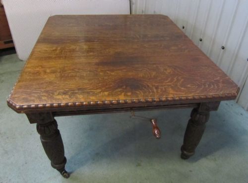 A Superbly Carved Victorian Oak Wind Out Extending Gothic Oak Dining Table