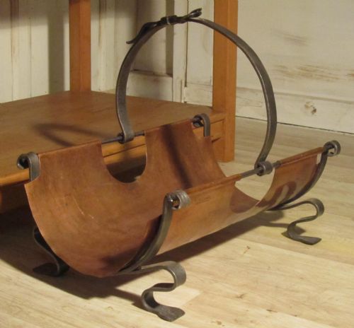 An Art Nouveau Copper and Iron Log Carrier