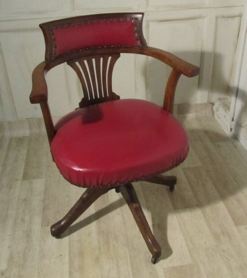 An Edwardian Mahogany and Oak Desk or Office Chair
