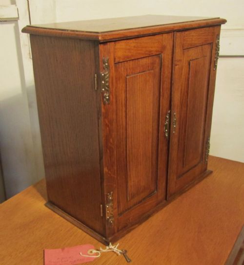 fig 1. A Victorian Arts and Crafts Golden Oak Collectors Cabinet