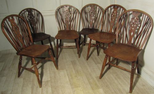 A Harlequin Set of 6 Victorian Beech & Elm Wheel Back Windsor Kitchen Dining Chairs