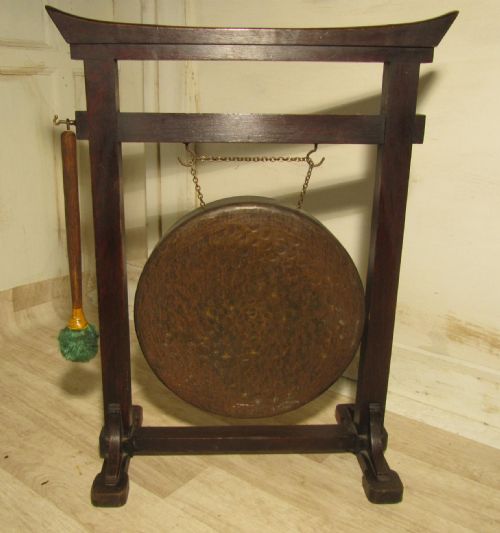 An Art Deco Oriental Brass Dinner Gong