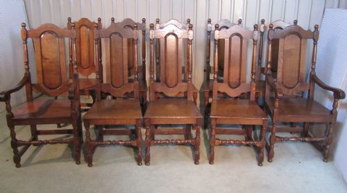 A Set of 10 Heavy Oak High Back Dining Chairs