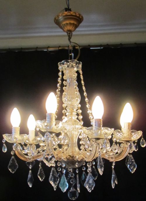 A Charming Glass and Brass 8 Lamp Chandelier