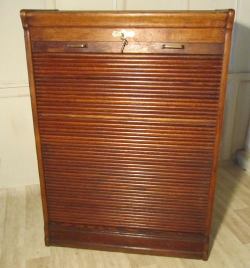 A Large Tambour Fronted Oak Art Deco Filing Cabinet