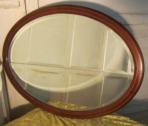 fig 1. A Very Large Edwardian Inlaid Mahogany Oval Wall Mirror