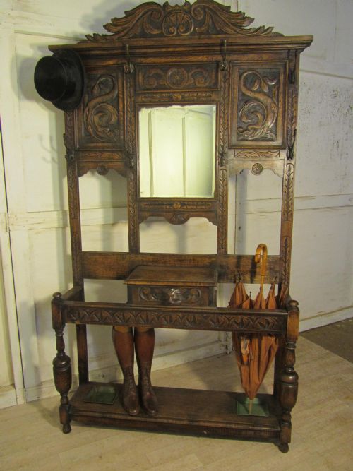 A Large Victorian Green Man Gothic Carved Oak Hall Stand