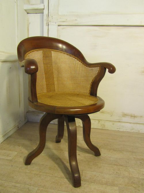 A Swivelling Mahogany Bergère Office Chair or Desk Chair  

