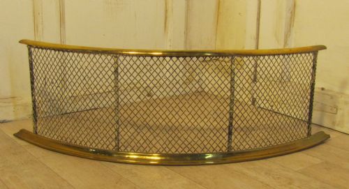 A Half Moon Curved Victorian Brass and Iron Club Fender