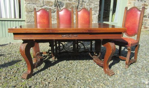 fig 1. A Large 19th Century Carved and Parquetry Oak Draw Leaf table