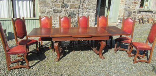 fig 2. A Large 19th Century Carved and Parquetry Oak Draw Leaf table