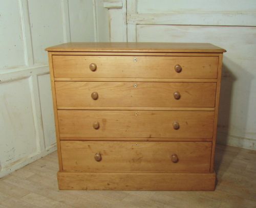 A  Large Victorian Stripped Pine Chest of Drawers