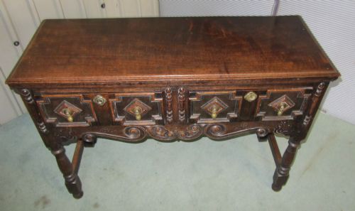 An Early Victorian Oak Cottage Size Carved Dresser Base