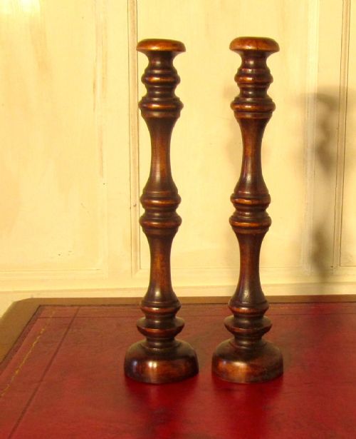 A Pair of Tall Turned Wooden Wig Stands, Shop Display Hats