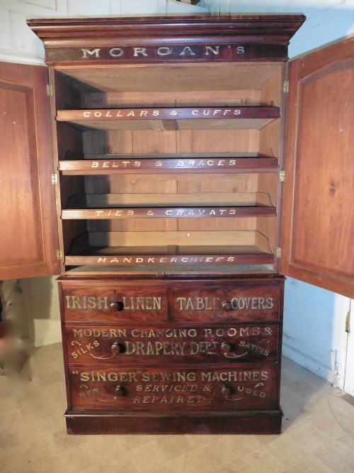 fig 2. A Victorian Flame Mahogany Linen Press from a Haberdashery or Drapers Shop Display
