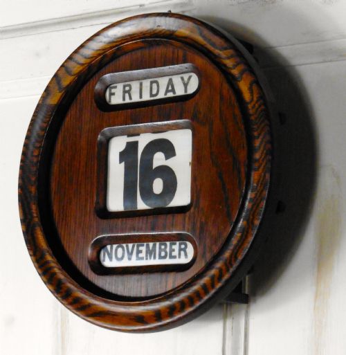 fig 1. An Art Deco Round Oak Perpetual Wall Calendar