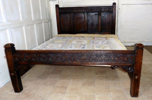 A Superb Victorian Gothic Carved Oak Double Bed