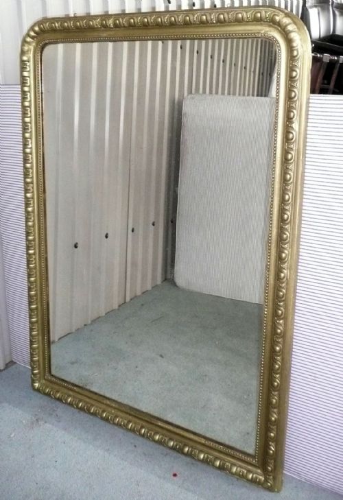fig 2. A Large French Gilt Arched Over Mantle Mirror