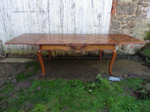 fig 2. A Large French Parquetry Draw Leaf Table and 6 Chairs