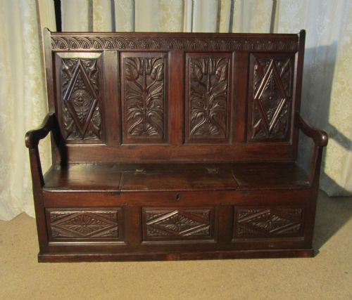 An 18th Century High Back Oak Box Settle