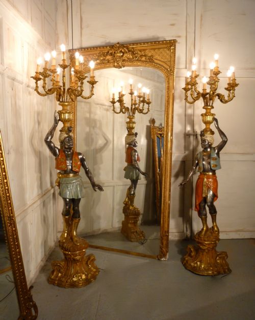 A Magnificent Pair of Venetian Blackamoor Candelabra