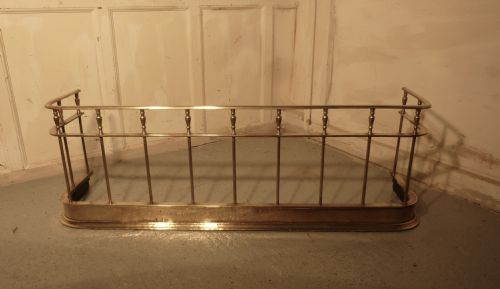 fig 1. A Large Victorian Brass Club Fender