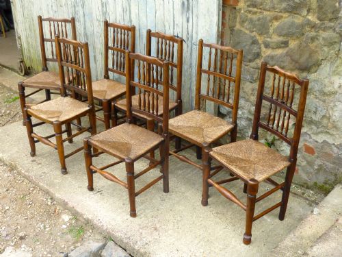fig 1. A Set of 7 Spindle Back Country Oak Dining Chairs