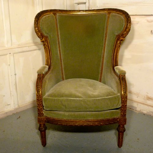 fig 1. 19th Century French Carved, Gilt Wing Arm Chair