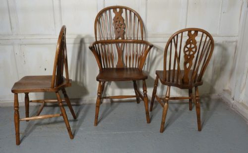 fig 1. A Set of 8 Elm and Ash Wheel Back Windsor Chairs