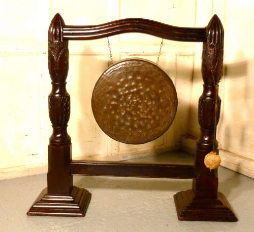 A Large Carved Mahogany & Brass Dinner Gong