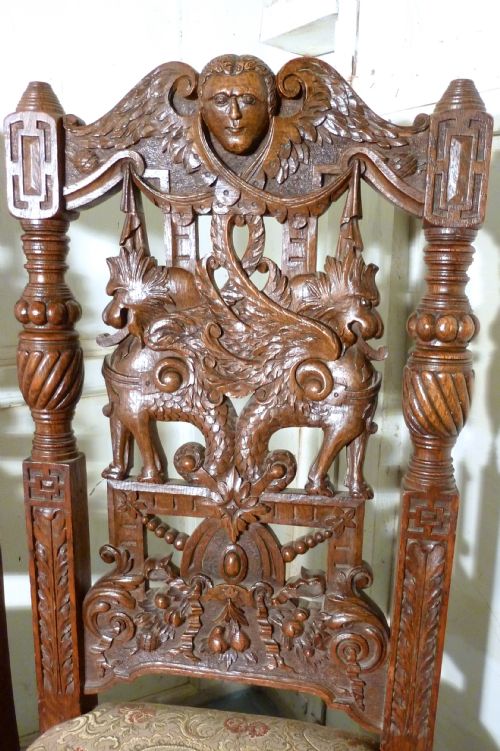 fig 2. A pair of Welsh Gothic Carved Oak Hall Chairs