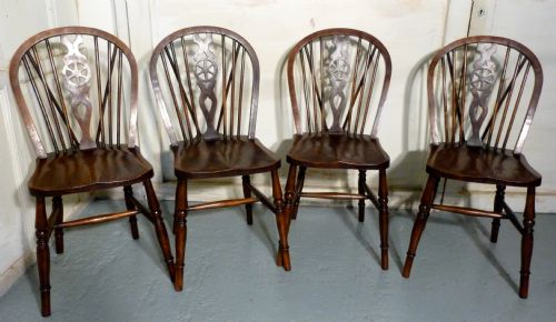 A Set of 4 Beech & Elm Wheel Back Windsor Kitchen Dining Chairs