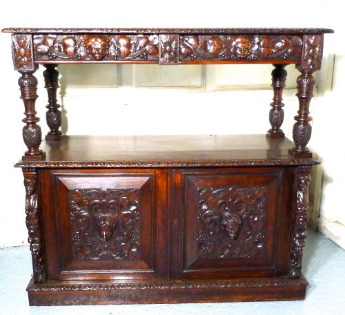 A Superbly Carved Green Man Oak Side Board or Buffet 