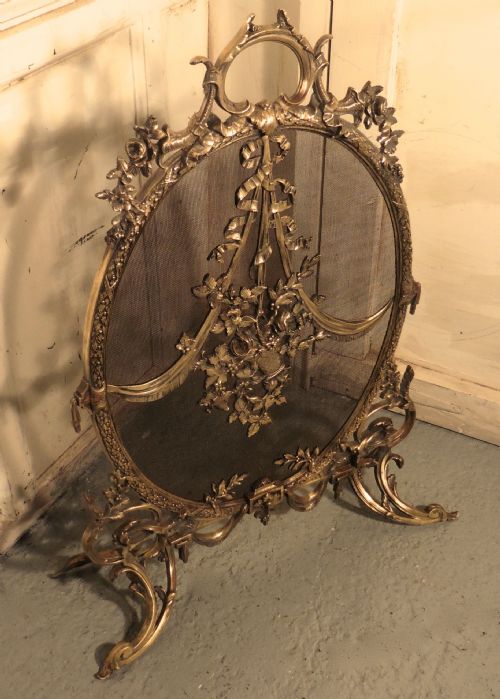 fig 2. A Superb French Brass Rococo Fire Guard, Spark screen