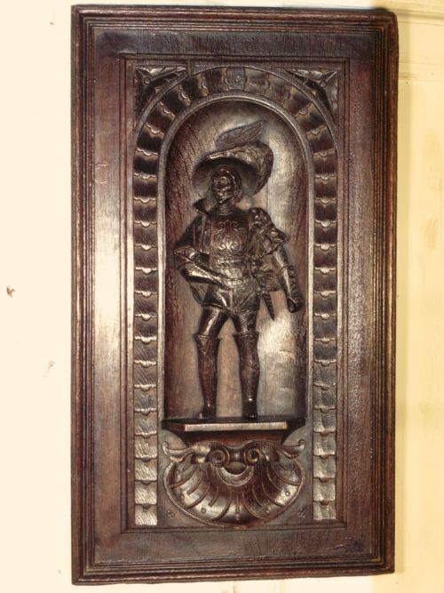 Carved Oak Panel of a Cavalier