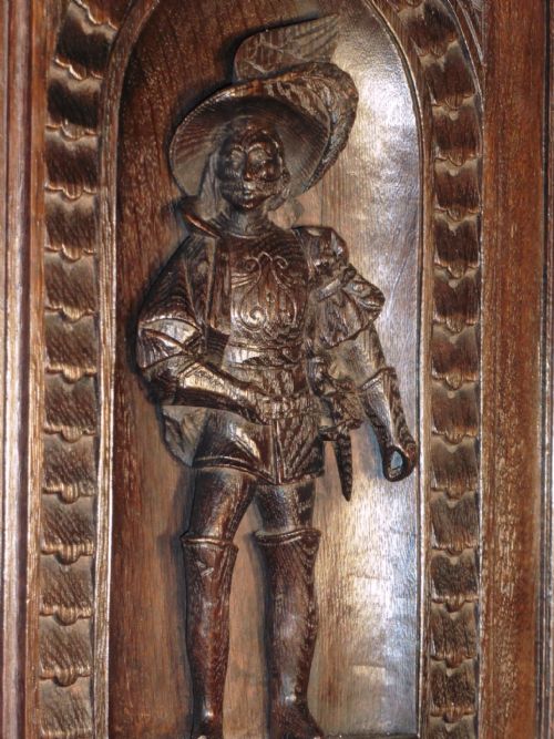 fig 1. Carved Oak Panel of a Cavalier