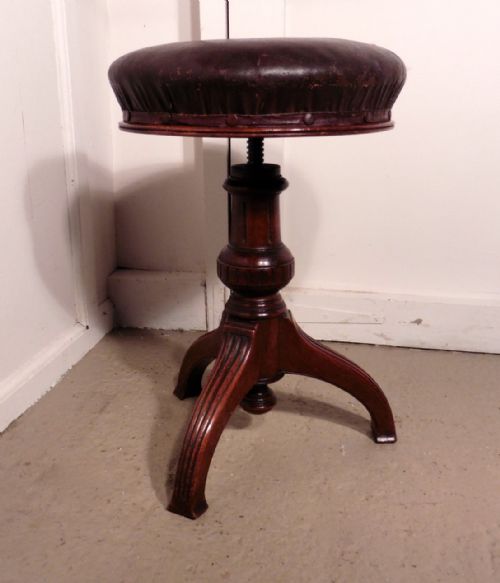 An Elegant Victorian Mahogany Swivel Piano Stool by Howe