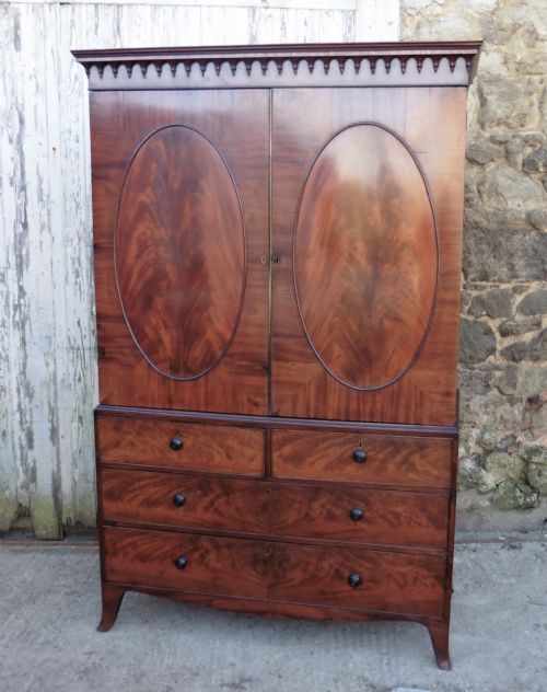 A Georgian Flame Mahogany Linen Press