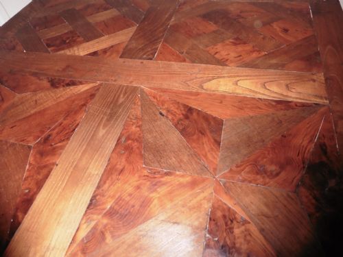 fig 1. A French Fruitwood Parquetry Table