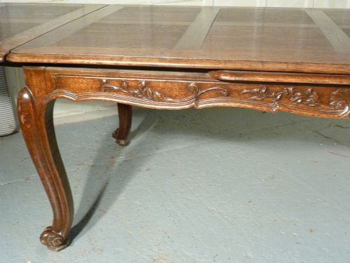 fig 2. A Large French Oak Draw Leaf Table