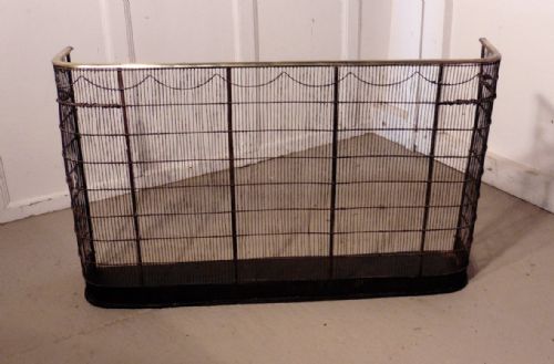 A Georgian Brass and Iron Club Fender or Nursery Fire Guard
