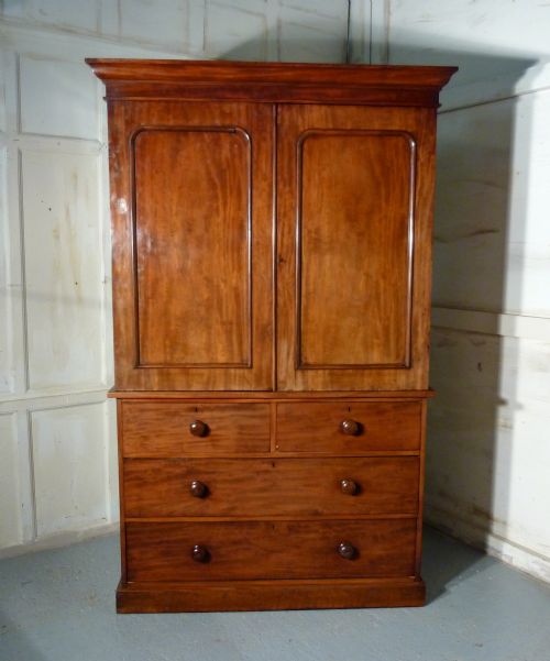A Victorian Flame Mahogany Linen Press