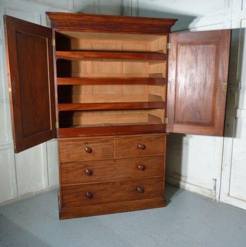 fig 2. A Victorian Flame Mahogany Linen Press 