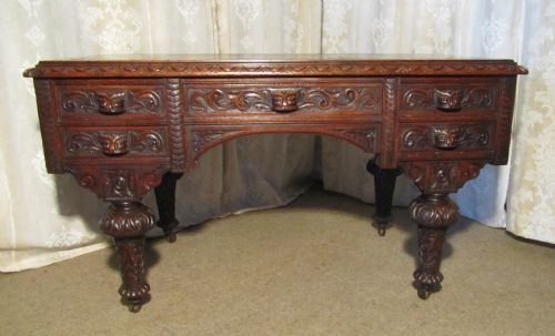 A Victorian Superbly Carved Pussy Oak or Green Man Desk