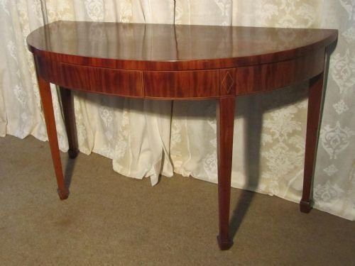 An Elegant Victorian Mahogany Half Round Hall Table