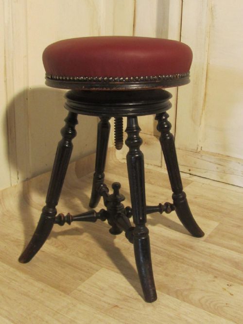 fig 1. A Charming Victorian Ebonised Mahogany and Leather Piano Stool