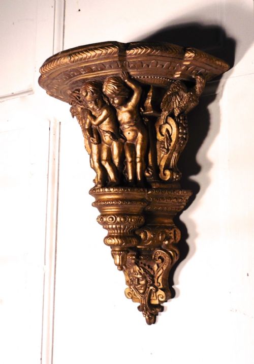 fig 2. A 19th Century Carved Wood Gilt Wall Bracket, Putti, Eagles