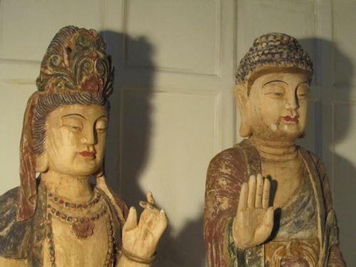 fig 1. Antique Carved and Painted Statues of a Standing Male and Female Buddha