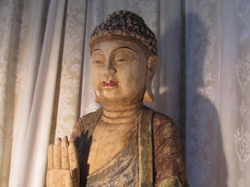 fig 2. Antique Carved and Painted Statues of a Standing Male and Female Buddha
