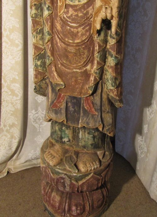 fig 3. Antique Carved and Painted Statues of a Standing Male and Female Buddha